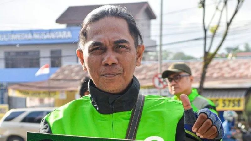 8 Tahun Jadi Mitra Gojek, Taufiq Bisa Bantu Istri Buka Usaha di Pasar Malam