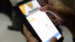 Ilustrasi pembayaran zakat fitrah online lewat platform Baznas (Foto: Baznas)